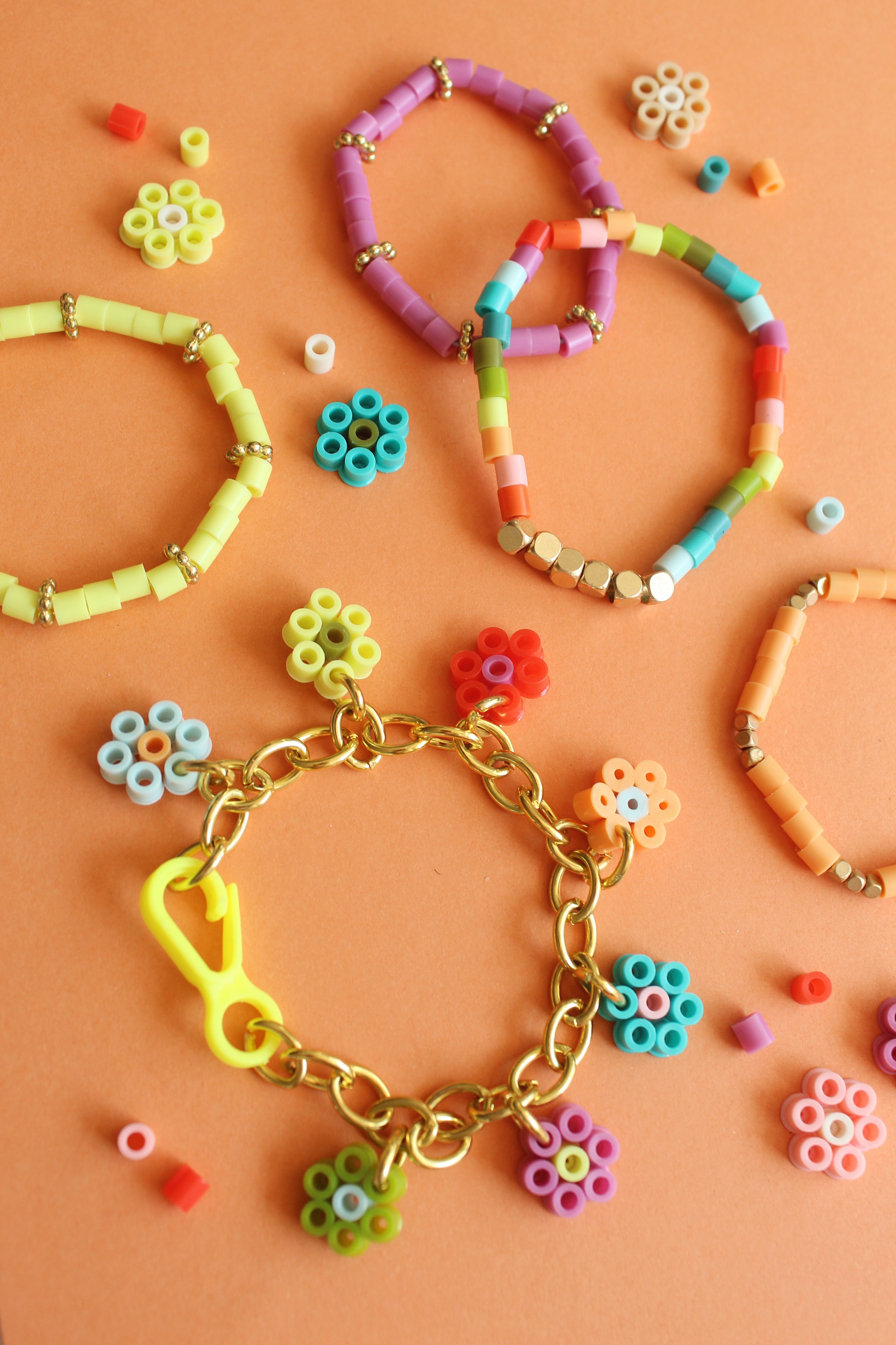 How to Make Flower Charm Perler Bead Bracelets + a tutorial featured by Top US Craft Blog + The Pretty Life Girls
