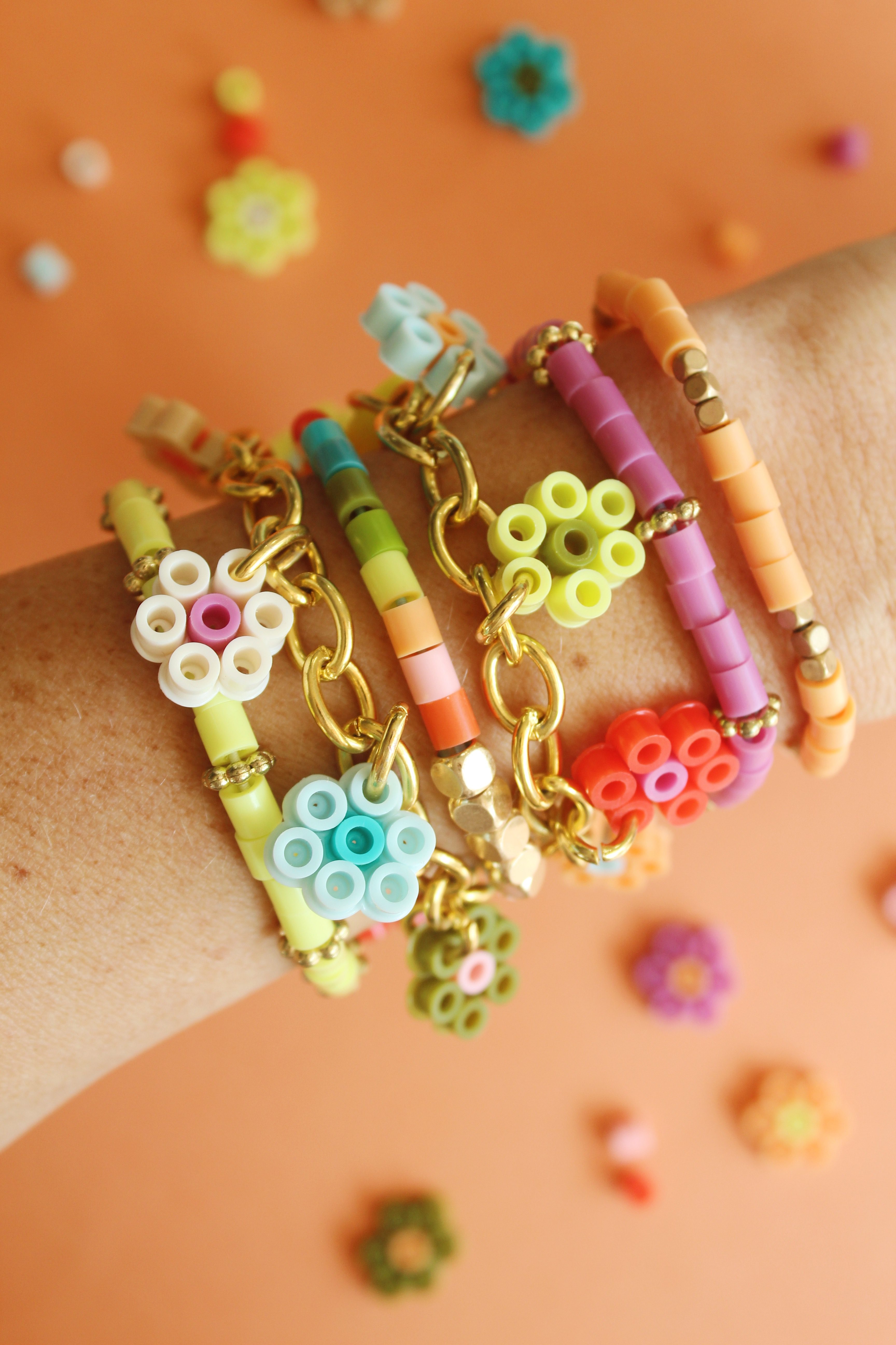How to Make Flower Charm Perler Bead Bracelets + a tutorial featured by Top US Craft Blog + The Pretty Life Girls